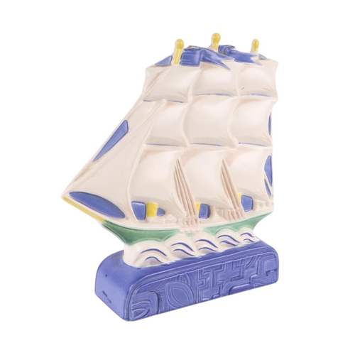 762 - A Poole Pottery three-mast sailing ship, 24cms wide.