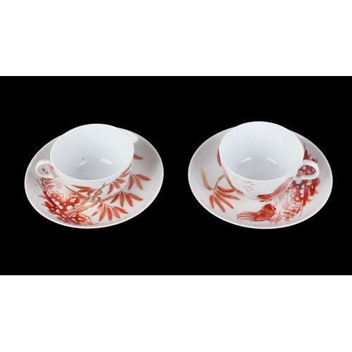 769 - A pair of 18th century Doccia porcelain tea cups and saucers decorated in Rust Roosters pattern.