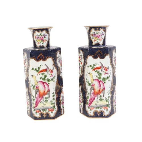 774 - A pair of Worcester Dr Wall style vases decorated with exotic birds and flowers, on a blue scale gro... 