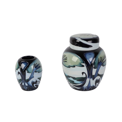 777 - A Moorcroft Knypersley pattern ginger jar and cover, 16cms high, boxed; together with an ovoid vase ... 