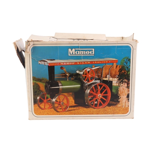 783 - A Mamod steam tractor, boxed; together with a Mamod log trailer (2).