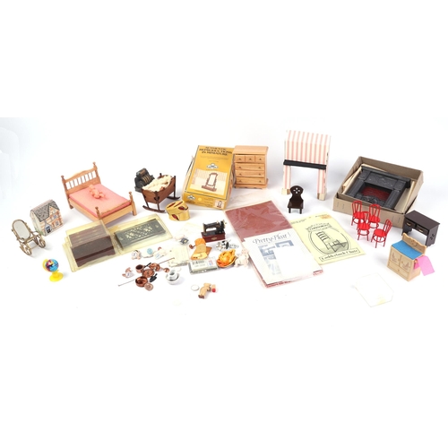 79 - A large quantity of doll's house furniture, mostly 20th century.