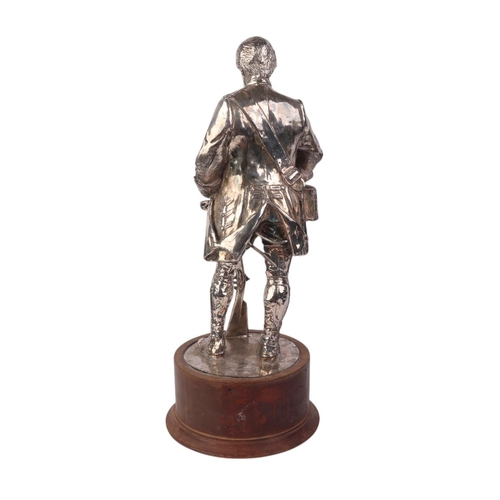 819 - American War of Independence interest:  A silver plated figural group depicting a Frontier Soldier h... 