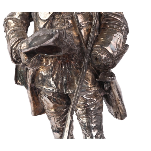 819 - American War of Independence interest:  A silver plated figural group depicting a Frontier Soldier h... 