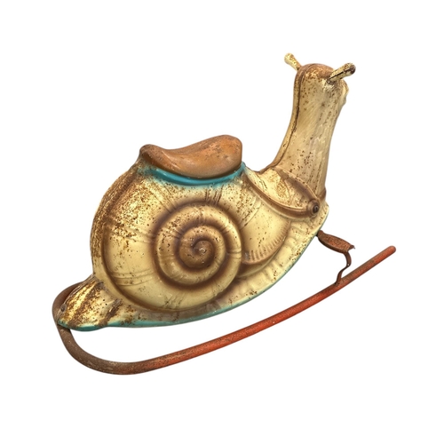 82 - A vintage Mobo rocking snail, 70cms long.