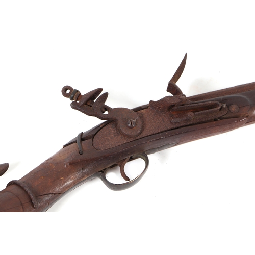 825 - An 18th century British flintlock musket with unusual shaped stock, 170cms overall length.Condition ... 