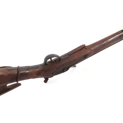 825 - An 18th century British flintlock musket with unusual shaped stock, 170cms overall length.Condition ... 