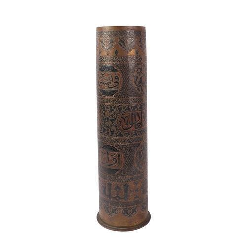 839 - A large WWI German shell case dated 1916 with fine Islamic damascene silver and copper decoration wi... 