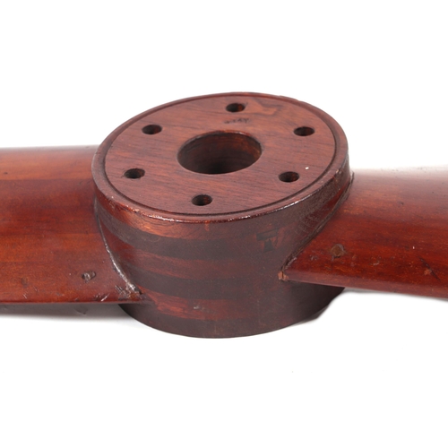 843 - A large mahogany propeller, 173cms long.