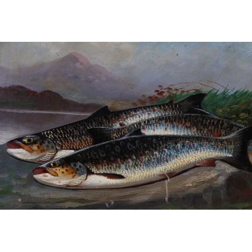 864 - J B Russell - Three Salmon on a Riverbank - signed lower right, oil on board, unframed, 36 by 26cms.