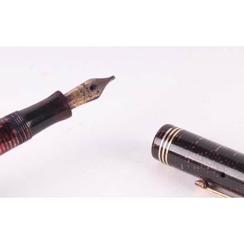 945 - A Parker Duofold fountain pen with 14K gold nib; together with four other fountain pens (5)