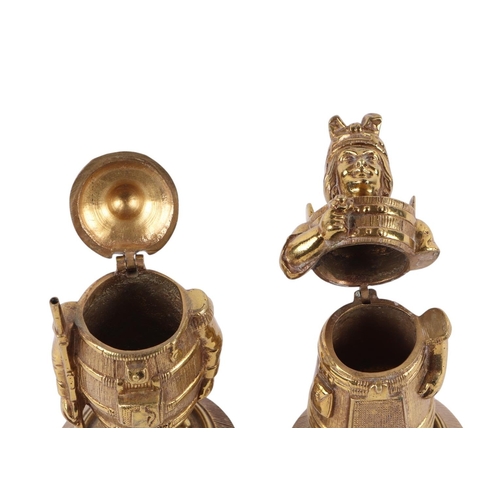 946 - A pair of novelty gilt brass figural go-to-bed vesta holders, modelled as a man and woman, the man w... 