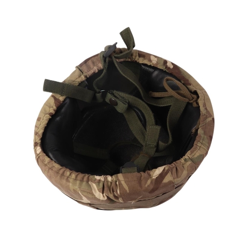 95 - A Para's helmet with camouflaged outer and chin strap.