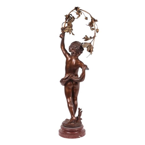 687 - After Auguste Moreau, a very large spelter bronzed lamp in the form of a cherub with a floral garlan... 