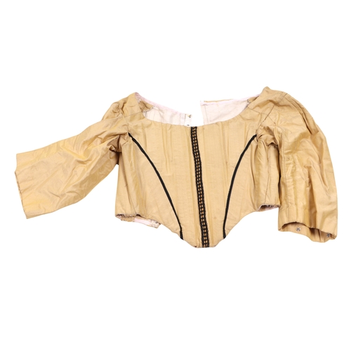 703 - A collection of flamboyant period costume props purportedly from the 1977 film 'The Man in the Iron ... 