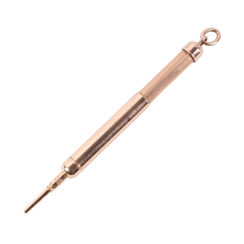 574 - A 14ct rose gold fob pencil, 4.5cms long, 8g.