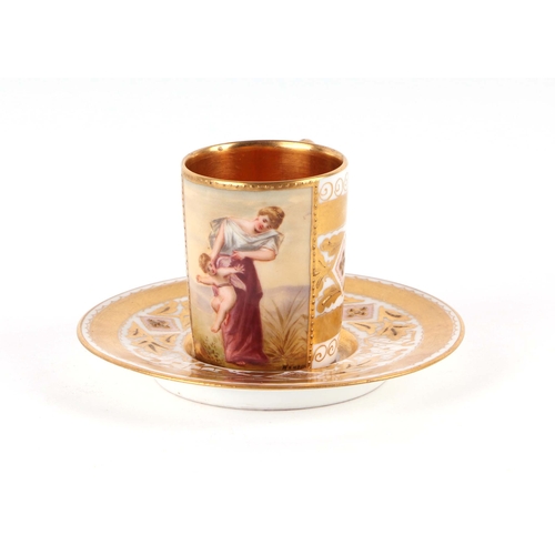 63 - A Vienna porcelain cabinet coffee cup and saucer decorated with a picture panel depicting a young wo... 