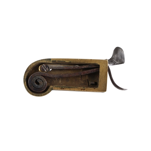 912 - An 18th century brass and steel spring fleam / lancet in original box, 5.5cms long.