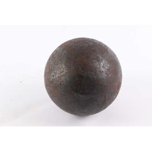 823 - An exploding cannon ball, possibly Napoleonic era, 14cms wide, weight 12kg.