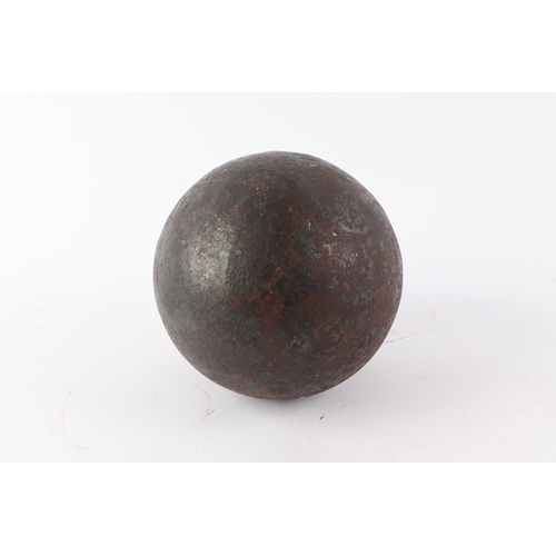 823 - An exploding cannon ball, possibly Napoleonic era, 14cms wide, weight 12kg.