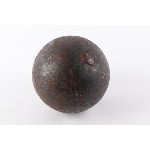 823 - An exploding cannon ball, possibly Napoleonic era, 14cms wide, weight 12kg.