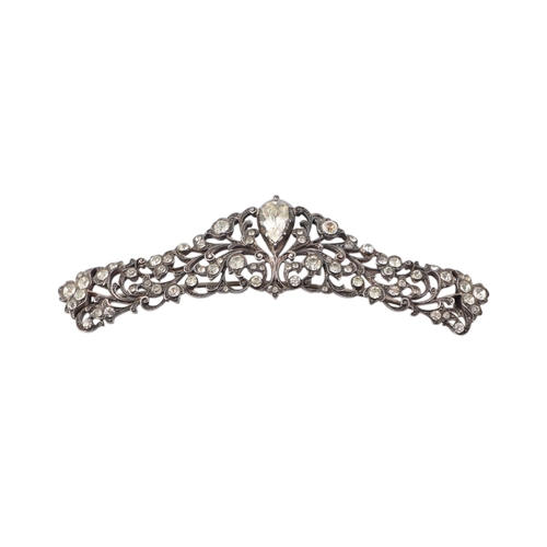 487 - A Victorian paste set brooch converted from a tiara, foil backed, 9.5cms wide; together with a silve... 