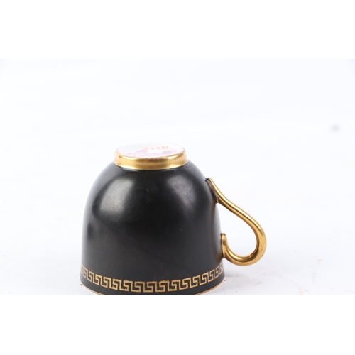 755 - A Royal Worcester black matt and gilt Greek Key design cased six-piece coffee cup and saucer set wit... 