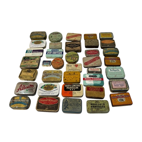 10 - A quantity of vintage advertising tins, mainly throat lozenges.