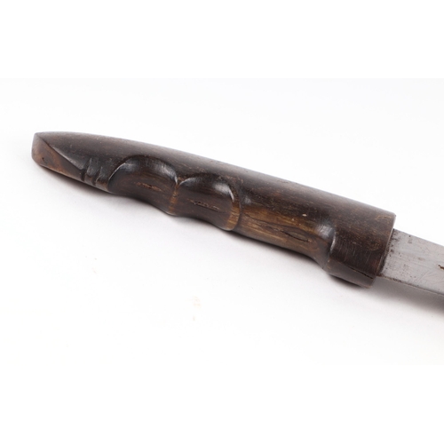 108 - A small Marsh Arab dagger with carved horn handle and leather scabbard, 28cms long.