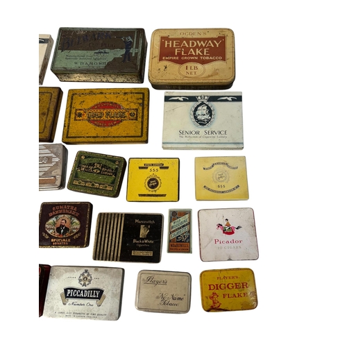 11 - A quantity of vintage advertising tins, mainly tobacco related.