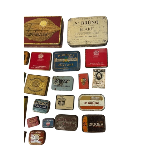 11 - A quantity of vintage advertising tins, mainly tobacco related.