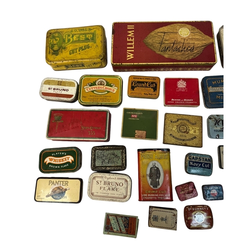 11 - A quantity of vintage advertising tins, mainly tobacco related.