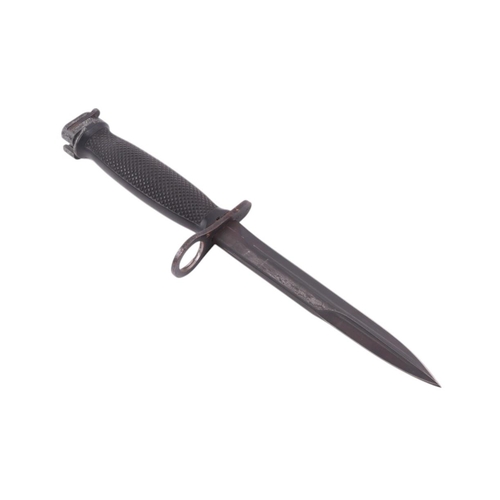 120 - A military bayonet with canvas frog and green metal scabbard, 33cms long.