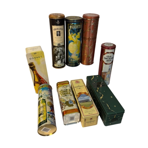 13 - A group of vintage advertising tins, mostly alcohol related.