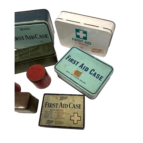 2 - A group of vintage advertising tin, mainly first aid and medical boxes.