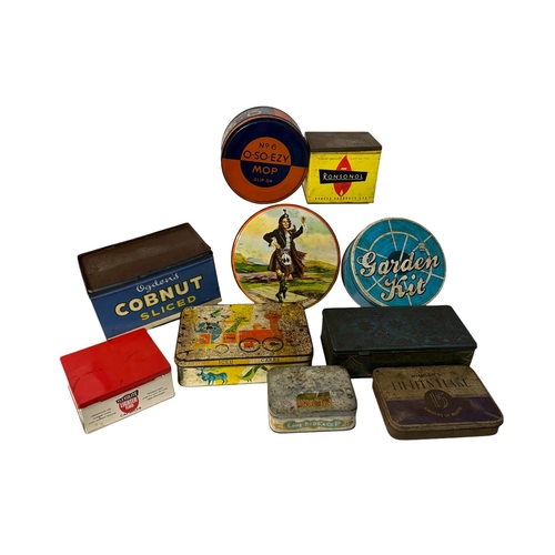 22 - A quantity of vintage advertising tins.