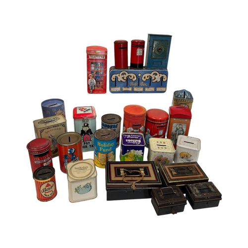 27 - A quantity of novelty advertising tin moneyboxes and similar tins.