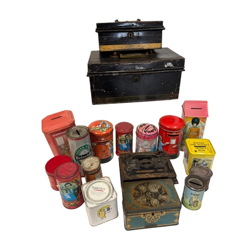 27 - A quantity of novelty advertising tin moneyboxes and similar tins.