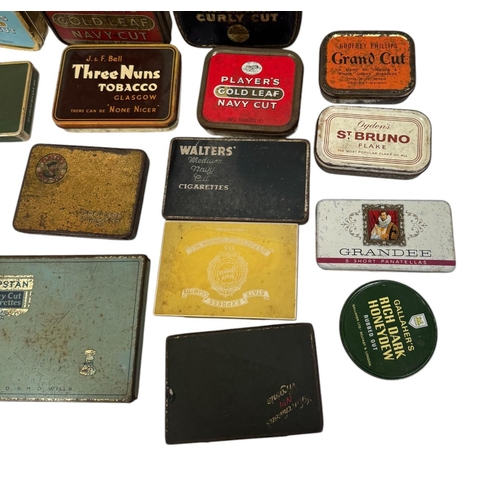 30 - A quantity of vintage advertising tins, mainly tobacco related.