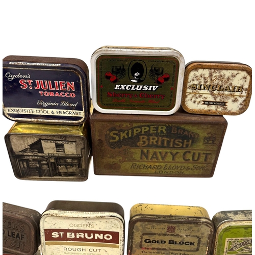 31 - A group of vintage advertising tins, mainly tobacco related.