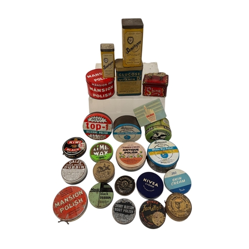 33 - A quantity of vintage advertising tins, mainly shoe polish.