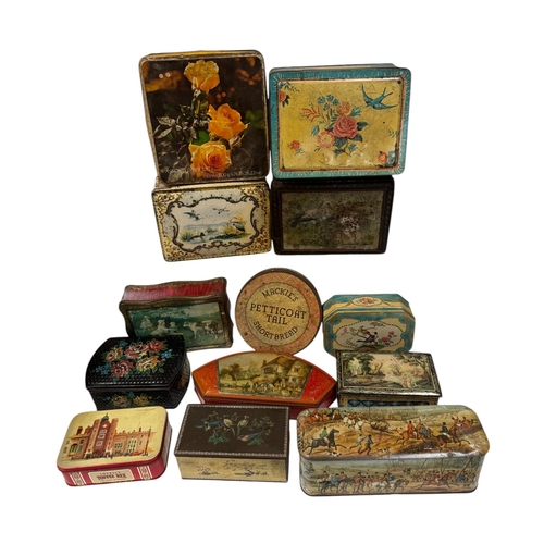 38 - A quantity of vintage advertising tins, mainly biscuit tins.