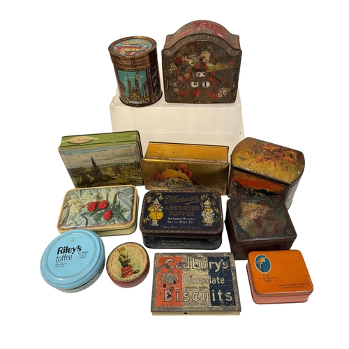 40 - A quantity of vintage advertising tins, mainly sweets and biscuit related.