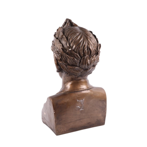 452 - A contemporary bronzed plaster bust of a Roman Emperor, 25cms wide.