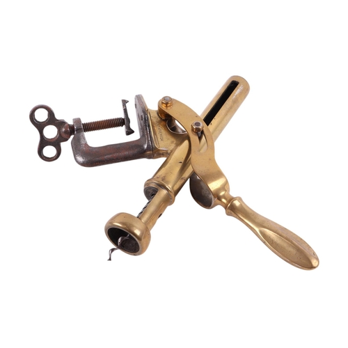 455 - A large brass bar-top corkscrew.