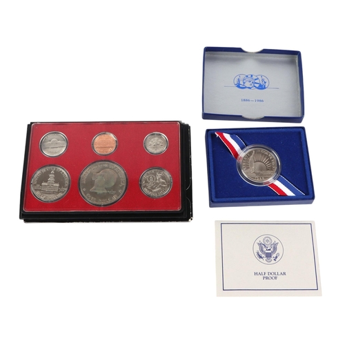 458 - US silver proof and uncirculated coin sets including two 1984 silver dollars and 1989 2-coin proof s... 