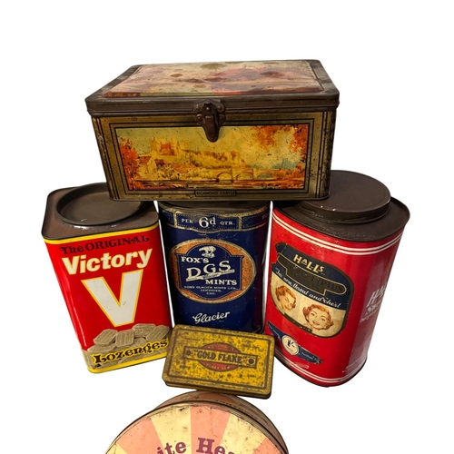 47 - A quantity of vintage advertising tins, mainly biscuit and sweet tins.