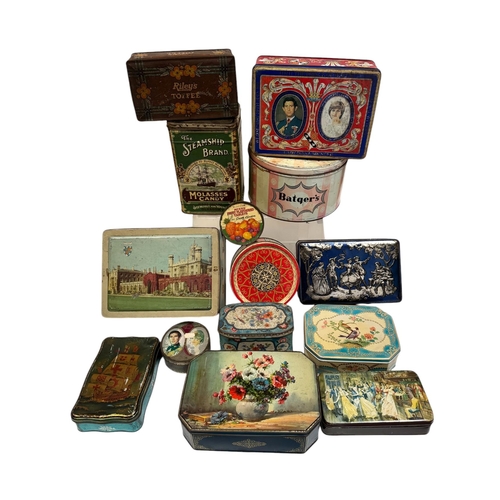 61 - A quantity of vintage advertising tins.