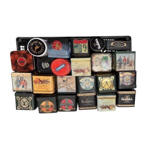 62 - A quantity of modern advertising tins, mainly alcohol related