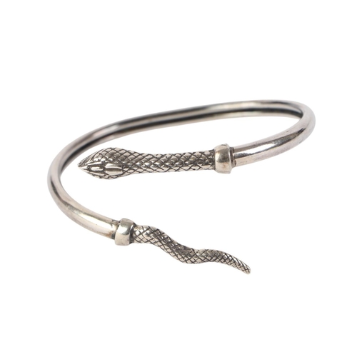 A modern silver torc snake bangle, 6.5cms diameter, 13g.